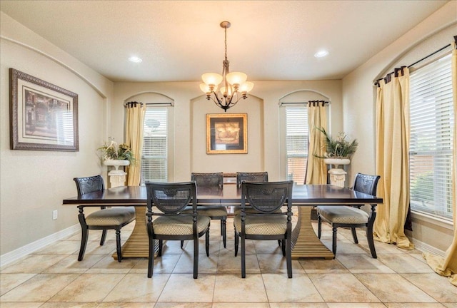 913 Overcup Dr, San Marcos, TX 78666 - dining area featuring a chandelier, plenty of natural light, recessed lighting, and light tile patterned floors