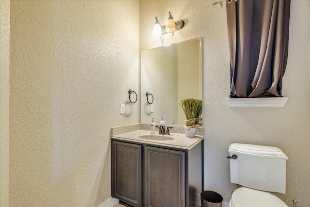 913 Overcup Dr, San Marcos, TX 78666 - bathroom with vanity and a textured wall