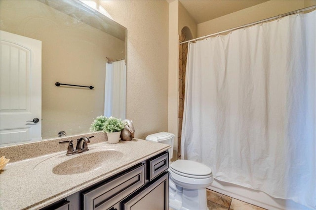 913 Overcup Dr, San Marcos, TX 78666 - full bath with vanity, tile patterned floors, and shower / bath combo with shower curtain