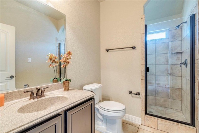 913 Overcup Dr, San Marcos, TX 78666 - bathroom with a shower stall, vanity, and tile patterned flooring