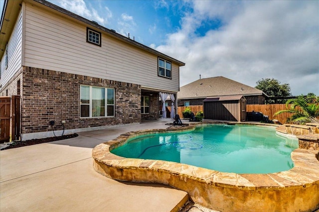 913 Overcup Dr, San Marcos, TX 78666 - view of pool featuring a storage shed, a patio area, and a fenced backyard