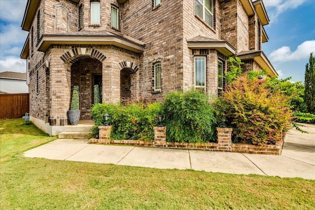 913 Overcup Dr, San Marcos, TX 78666 - view of exterior entry featuring stone siding and brick siding