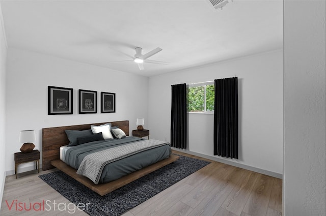 4712 Carsonhill Dr, Austin, TX 78723 - bedroom with light wood-type flooring and ceiling fan