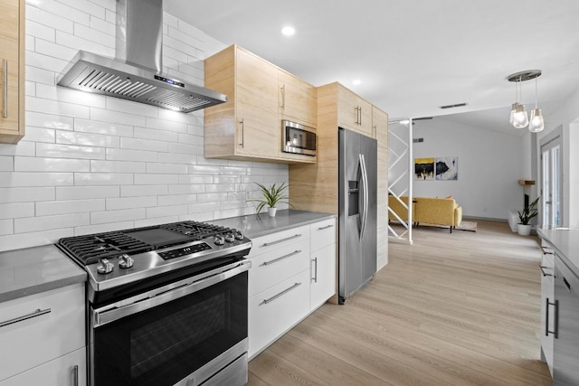 4712 Carsonhill Dr, Austin, TX 78723 - kitchen with appliances with stainless steel finishes, wall chimney range hood, backsplash, light brown cabinets, and light wood finished floors