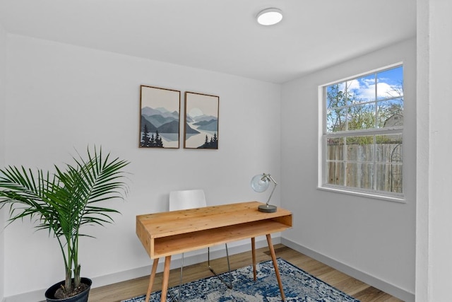4712 Carsonhill Dr, Austin, TX 78723 - office area with baseboards and wood finished floors