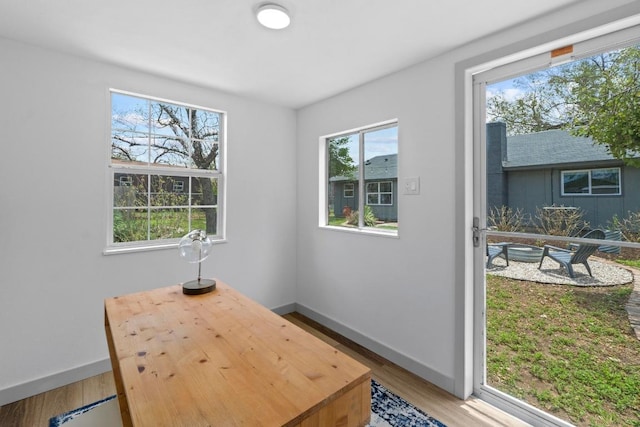 4712 Carsonhill Dr, Austin, TX 78723 - dining room featuring baseboards and light wood-style floors