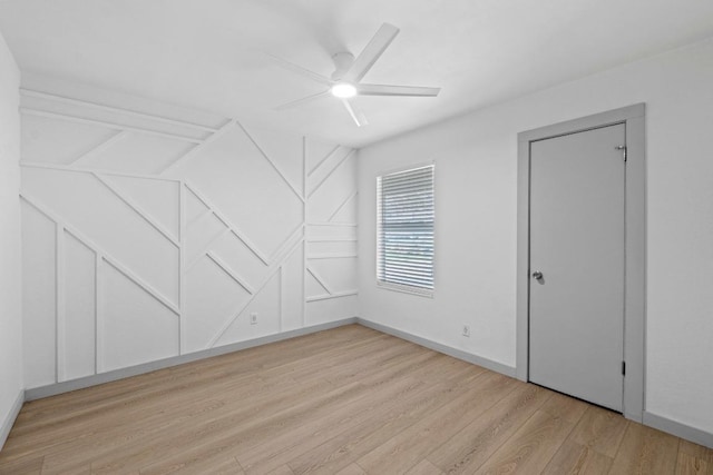 4712 Carsonhill Dr, Austin, TX 78723 - unfurnished bedroom with light wood finished floors and ceiling fan