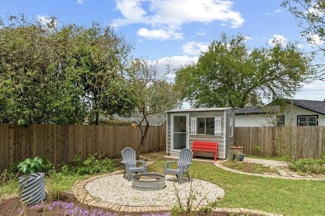 4712 Carsonhill Dr, Austin, TX 78723 - view of outdoor structure featuring a fenced backyard and a fire pit
