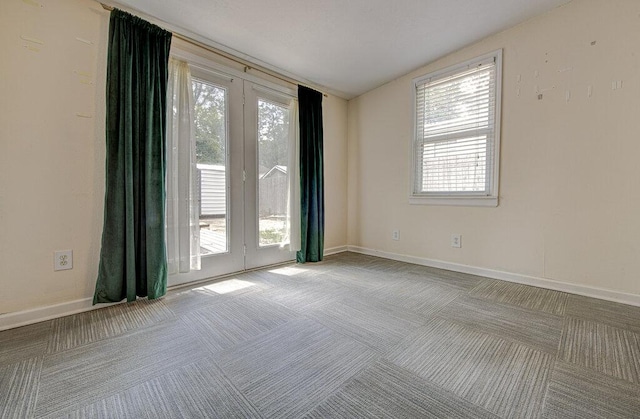 3303 Hollywood Ave, Austin, TX 78722 - carpeted spare room featuring plenty of natural light