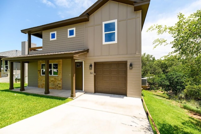 302 Castlehigh Dr, Granite Shoals, TX 78654 - view of front facade featuring board and batten siding, concrete driveway, a front lawn, a garage, and stone siding