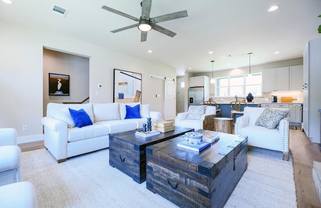 302 Castlehigh Dr, Granite Shoals, TX 78654 - living area featuring a ceiling fan, light wood-style floors, and recessed lighting