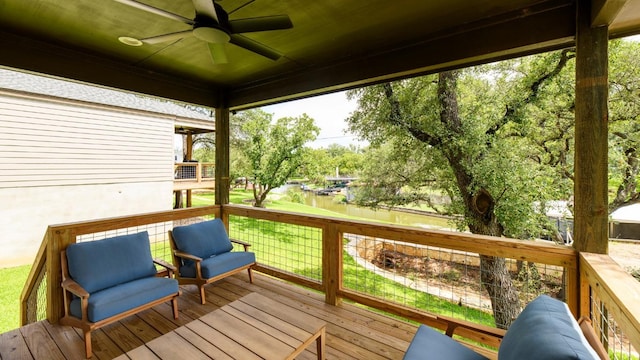 302 Castlehigh Dr, Granite Shoals, TX 78654 - wooden deck with a water view, ceiling fan, and a yard