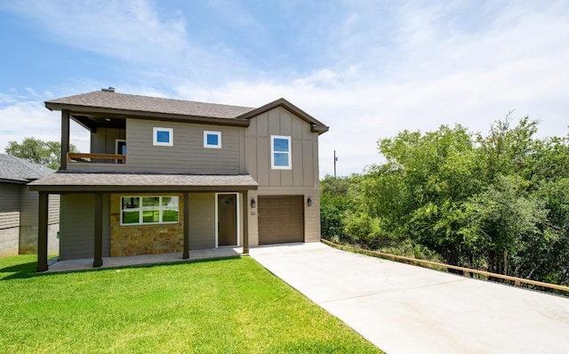 302 Castlehigh Dr, Granite Shoals, TX 78654 - contemporary home featuring board and batten siding, concrete driveway, a front yard, an attached garage, and a balcony