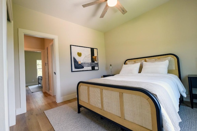 302 Castlehigh Dr, Granite Shoals, TX 78654 - bedroom with light wood-style floors, a ceiling fan, and lofted ceiling