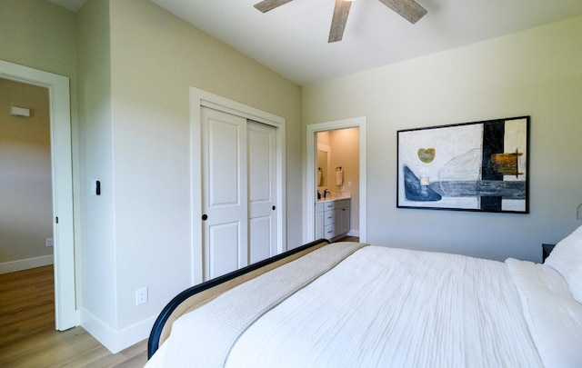 302 Castlehigh Dr, Granite Shoals, TX 78654 - bedroom featuring light wood-type flooring, a closet, and a ceiling fan