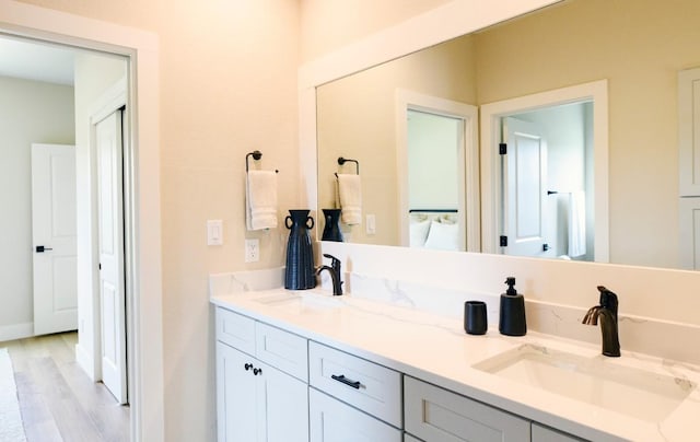 302 Castlehigh Dr, Granite Shoals, TX 78654 - full bath featuring double vanity and wood finished floors