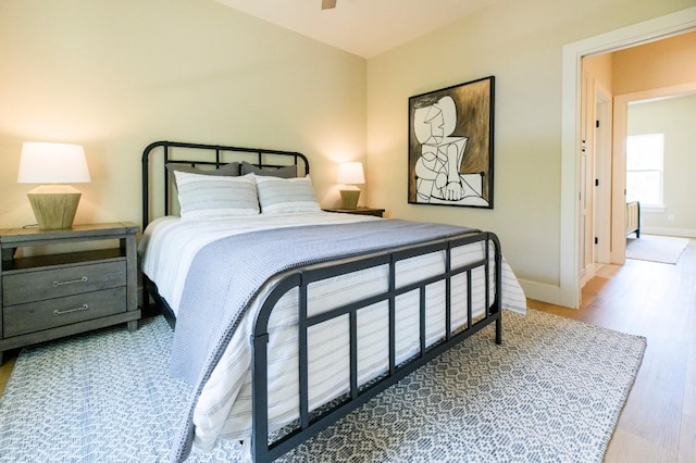 302 Castlehigh Dr, Granite Shoals, TX 78654 - bedroom featuring wood finished floors and baseboards