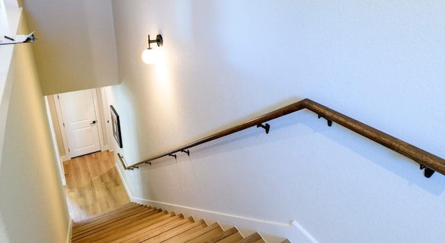 302 Castlehigh Dr, Granite Shoals, TX 78654 - stairs with wood finished floors and baseboards