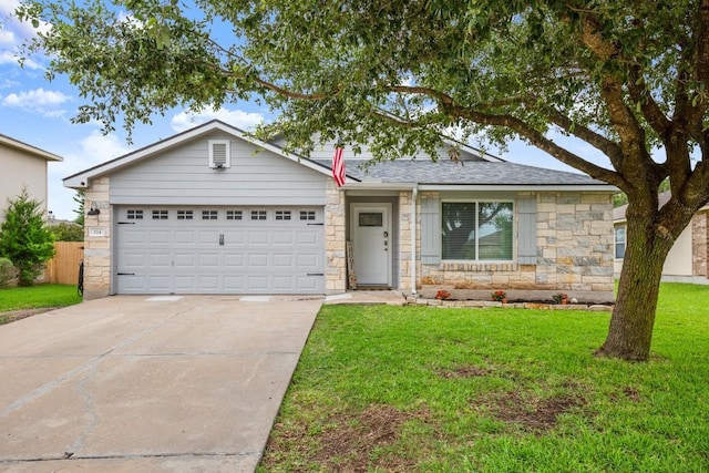 124 Phillips St, Hutto, TX 78634 - ranch-style house featuring stone siding, concrete driveway, a garage, and roof with shingles