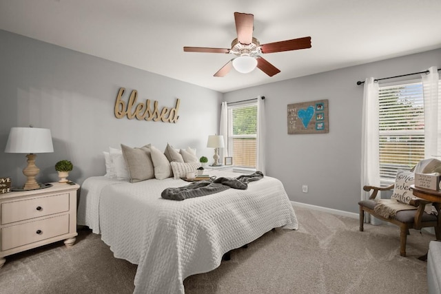 124 Phillips St, Hutto, TX 78634 - carpeted bedroom featuring baseboards and a ceiling fan