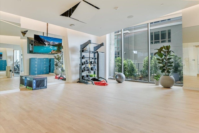 44 E Ave Unit 1909, Austin, TX 78701 - workout area with wood finished floors and floor to ceiling windows