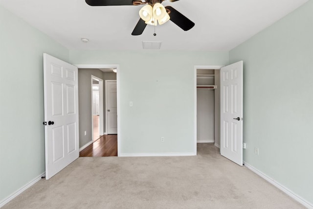 703 Amy Cir, Marble Falls, TX 78654 - unfurnished bedroom featuring carpet flooring, a closet, and a ceiling fan