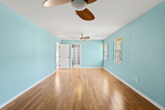 703 Amy Cir, Marble Falls, TX 78654 - unfurnished room with a ceiling fan and wood finished floors