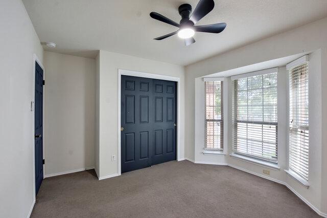 1119 Brinkley Dr, Cedar Park, TX 78613 - foyer featuring carpet floors and a ceiling fan