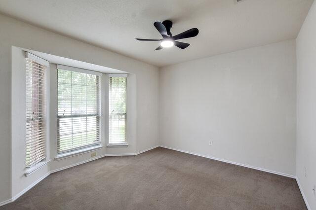 1119 Brinkley Dr, Cedar Park, TX 78613 - carpeted spare room with baseboards and ceiling fan