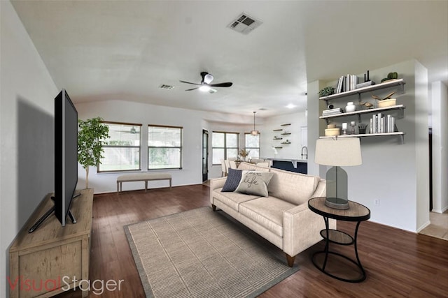 1119 Brinkley Dr, Cedar Park, TX 78613 - living area featuring a ceiling fan, dark wood-style flooring, and lofted ceiling