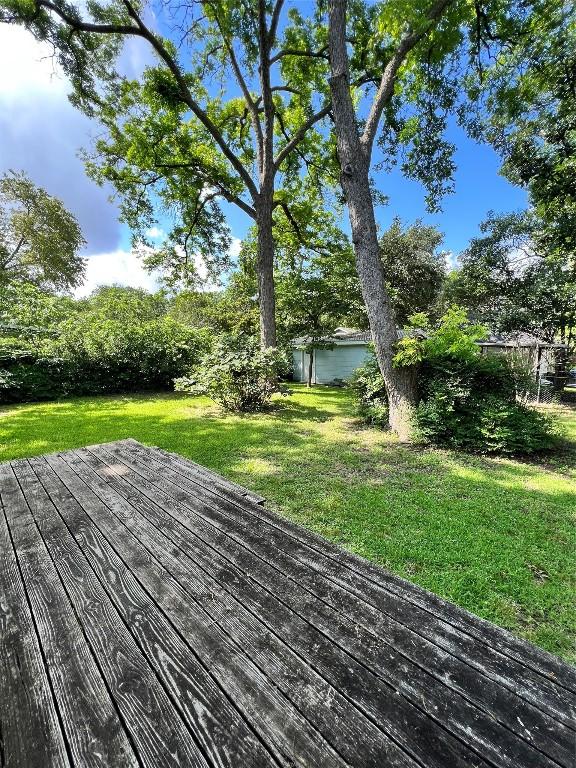 1511 Romeria Dr, Austin, TX 78757 - deck featuring a lawn