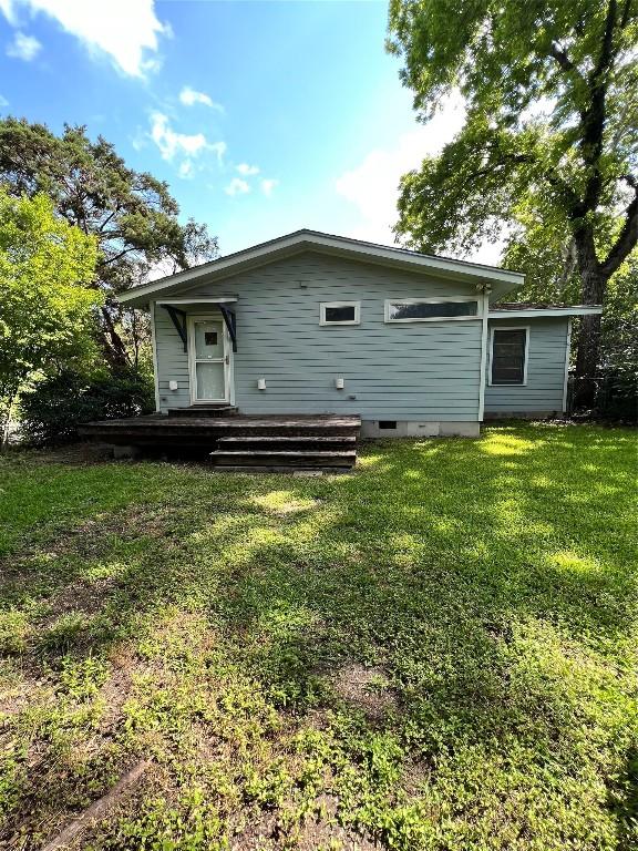 1511 Romeria Dr, Austin, TX 78757 - rear view of house with a yard and a wooden deck