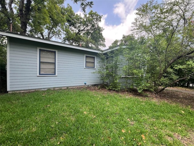 1511 Romeria Dr, Austin, TX 78757 - view of home's exterior with a lawn