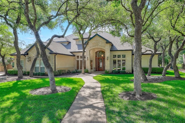25 Meadows End Dr, Georgetown, TX 78628 - view of front of house featuring stone siding and a front lawn