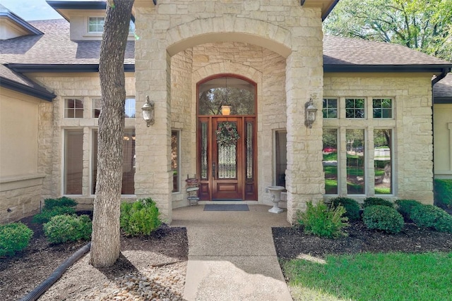 25 Meadows End Dr, Georgetown, TX 78628 - entrance to property with stone siding and a shingled roof