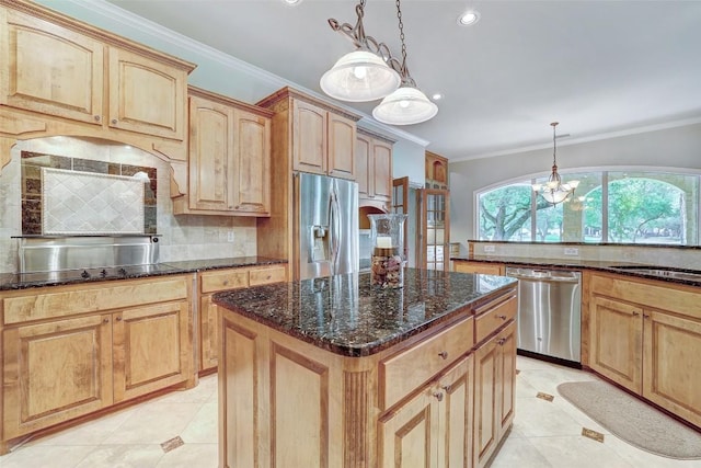 25 Meadows End Dr, Georgetown, TX 78628 - kitchen with a center island, appliances with stainless steel finishes, decorative backsplash, dark stone counters, and a chandelier