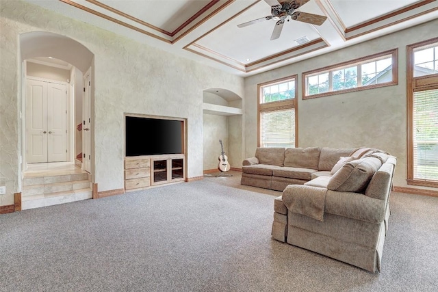 25 Meadows End Dr, Georgetown, TX 78628 - living area featuring arched walkways, healthy amount of natural light, ceiling fan, ornamental molding, and a high ceiling