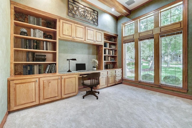 25 Meadows End Dr, Georgetown, TX 78628 - office with built in study area, light colored carpet, a towering ceiling, and beam ceiling
