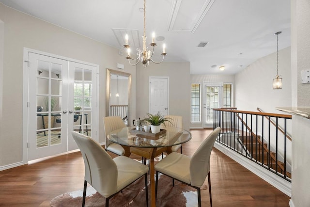 14815 Avery Ranch Blvd Unit 3301, Austin, TX 78717 - dining room featuring wood finished floors, plenty of natural light, french doors, and a chandelier