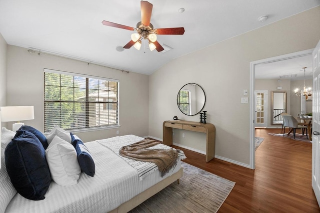 14815 Avery Ranch Blvd Unit 3301, Austin, TX 78717 - bedroom featuring wood finished floors, a chandelier, vaulted ceiling, and a ceiling fan