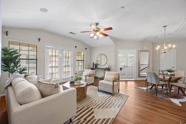 14815 Avery Ranch Blvd Unit 3301, Austin, TX 78717 - living room featuring a chandelier, wood finished floors, french doors, ceiling fan, and lofted ceiling