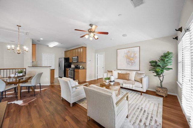 14815 Avery Ranch Blvd Unit 3301, Austin, TX 78717 - living area with a ceiling fan, dark wood-style floors, and a chandelier