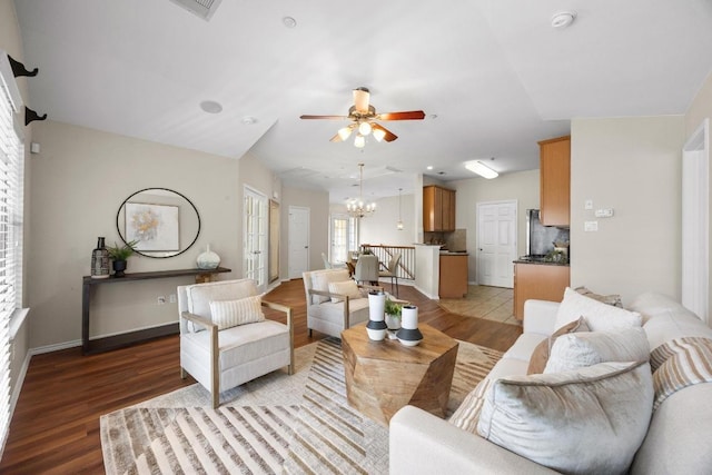14815 Avery Ranch Blvd Unit 3301, Austin, TX 78717 - living area with light wood finished floors, a ceiling fan, and a chandelier