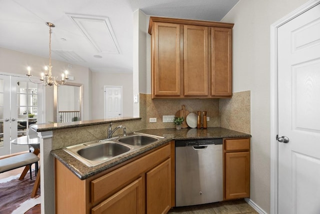 14815 Avery Ranch Blvd Unit 3301, Austin, TX 78717 - kitchen featuring dishwasher, backsplash, a peninsula, brown cabinetry, and hanging light fixtures