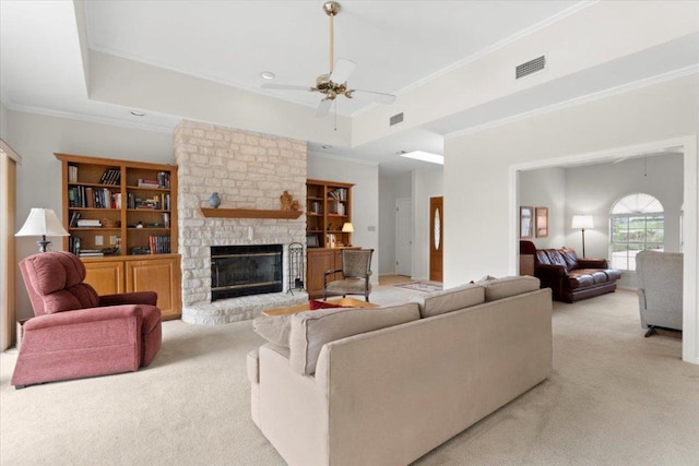 124 Hurst Creek Rd, Austin, TX 78734 - living area with light carpet, crown molding, ceiling fan, a fireplace, and recessed lighting