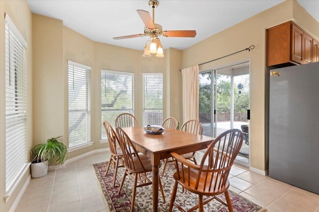 124 Hurst Creek Rd, Austin, TX 78734 - dining space with light tile patterned floors, plenty of natural light, and ceiling fan