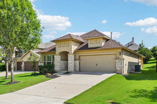 3213 Venezia Vw, Leander, TX 78641 - view of front of property featuring stucco siding, stone siding, a garage, driveway, and a front yard