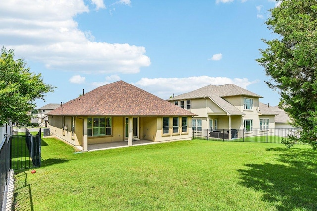 3213 Venezia Vw, Leander, TX 78641 - back of house featuring stucco siding, a patio, a fenced backyard, and a shingled roof