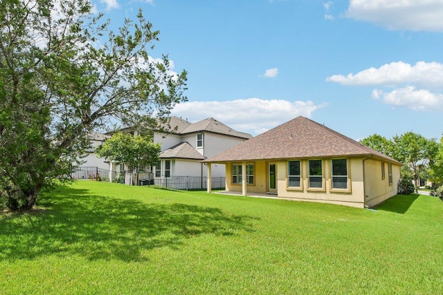3213 Venezia Vw, Leander, TX 78641 - back of property with a patio, stucco siding, and a shingled roof