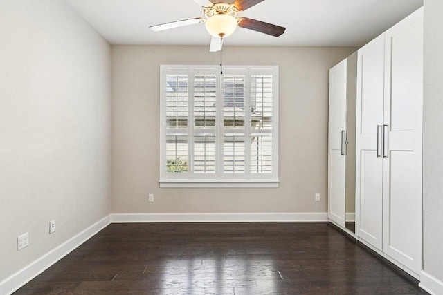 3213 Venezia Vw, Leander, TX 78641 - unfurnished bedroom with dark wood-style flooring and ceiling fan